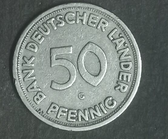 1949 G Germany 50 Pfennig coin. A woman planting an oak